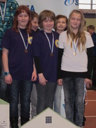 12VT sarjan kiväärin pronssimitalistit: Anniina Majapuro, Elli Saarela ja Sofia Mäkinen